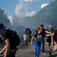 Protesters fleeing clouds of tear gas in Philadelphia’s Center City neighborhood on June 1, 2020.